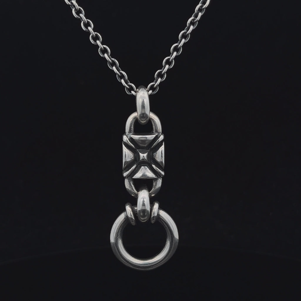 michael evanet oxidised silver double sided rose hoop pendant designyard contemporary jewellery gallery dublin ireland rock