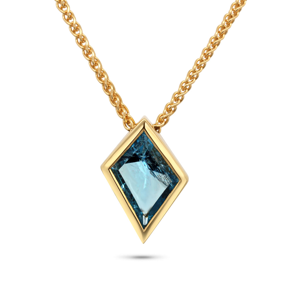 Photograph 1 of 18k Fair Trade Yellow Gold Tenues Bezəl Free Form Aquamarine Pendant. Available on DESIGNYARD.com and in our Jewellery Shop Dublin, Ireland. #1 for Contemporary Jewellery.