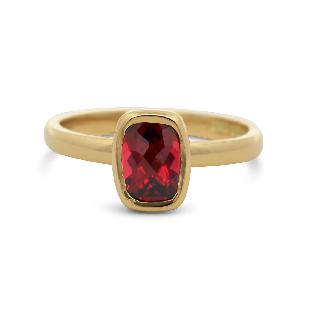 Photograph 1 of 18k Yellow Gold Mēdēəm Bezəl Garnet Engagement Ring. Available on DESIGNYARD.com and in our Jewellery Shop Dublin, Ireland. Worldwide Shipping with DHL.