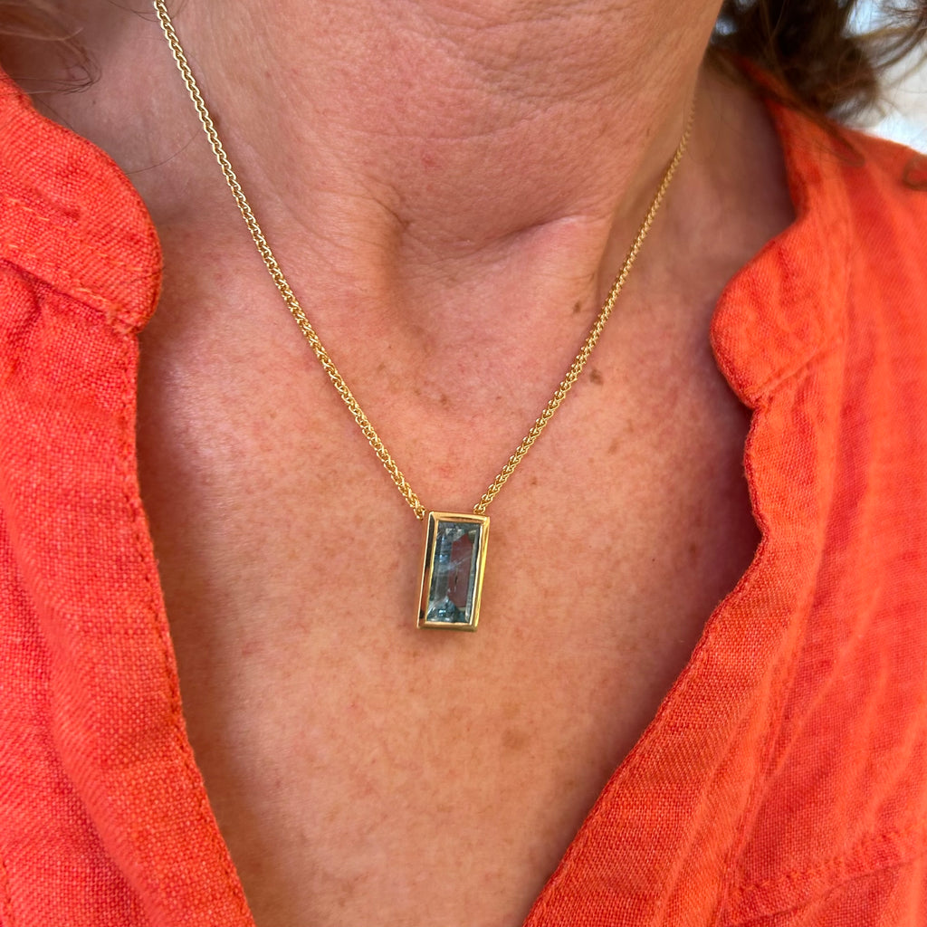 Photograph 5 of 18k Fair Trade Yellow Gold Tenues Bezəl Mirror Aquamarine Pendant. Available on DESIGNYARD.com and in our Jewellery Shop Dublin, Ireland. #1 for Contemporary Jewelery.