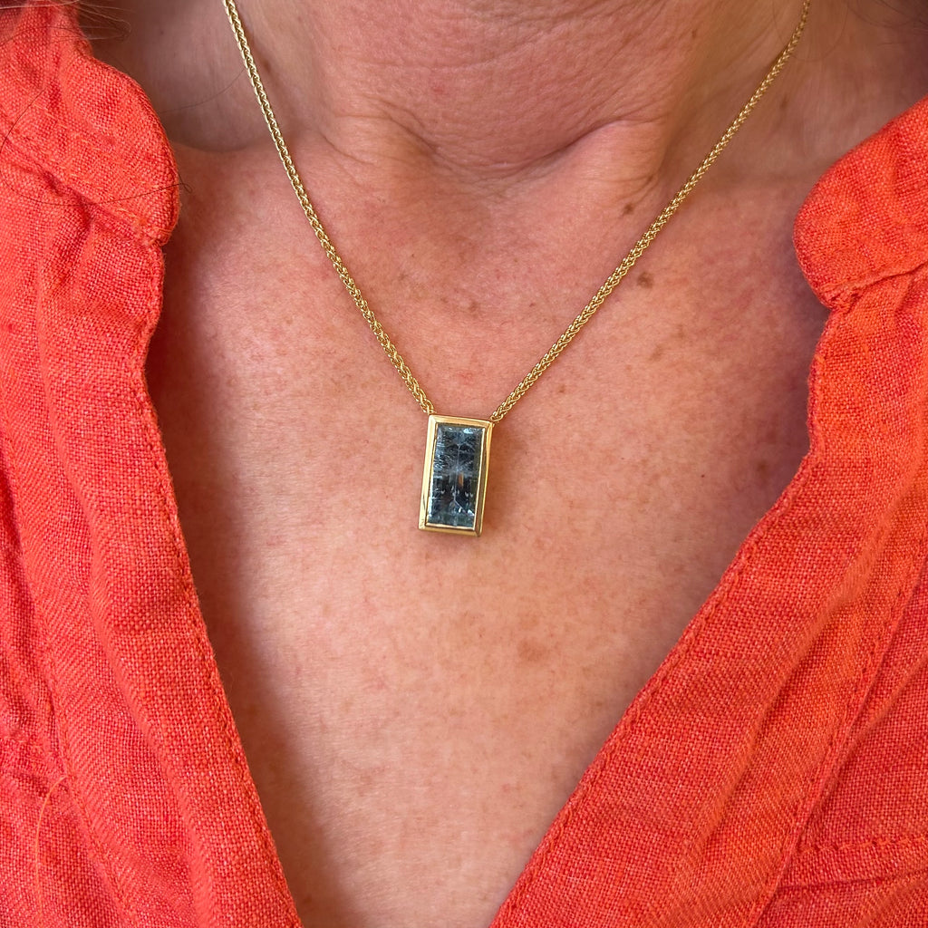 Photograph 4 of 18k Fair Trade Yellow Gold Tenues Bezəl Mirror Aquamarine Pendant. Available on DESIGNYARD.com and in our Jewellery Shop Dublin, Ireland. #1 for Contemporary Jewelery.