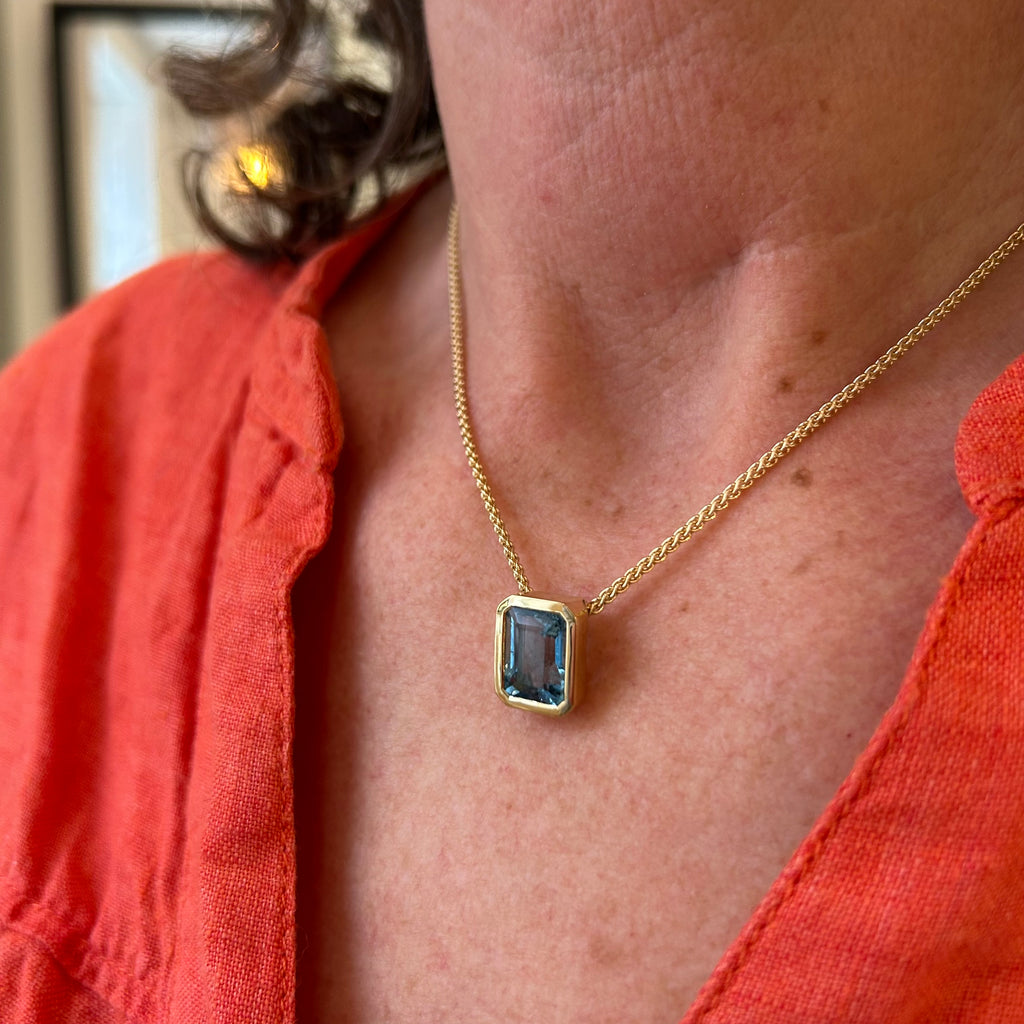 Photograph 2 of 18k Fair Trade Yellow Gold Tenues Bezəl Aquamarine Pendant. Available on DESIGNYARD.com and in our Jewellery Shop Dublin, Ireland. #1 for Contemporary Jewellery.