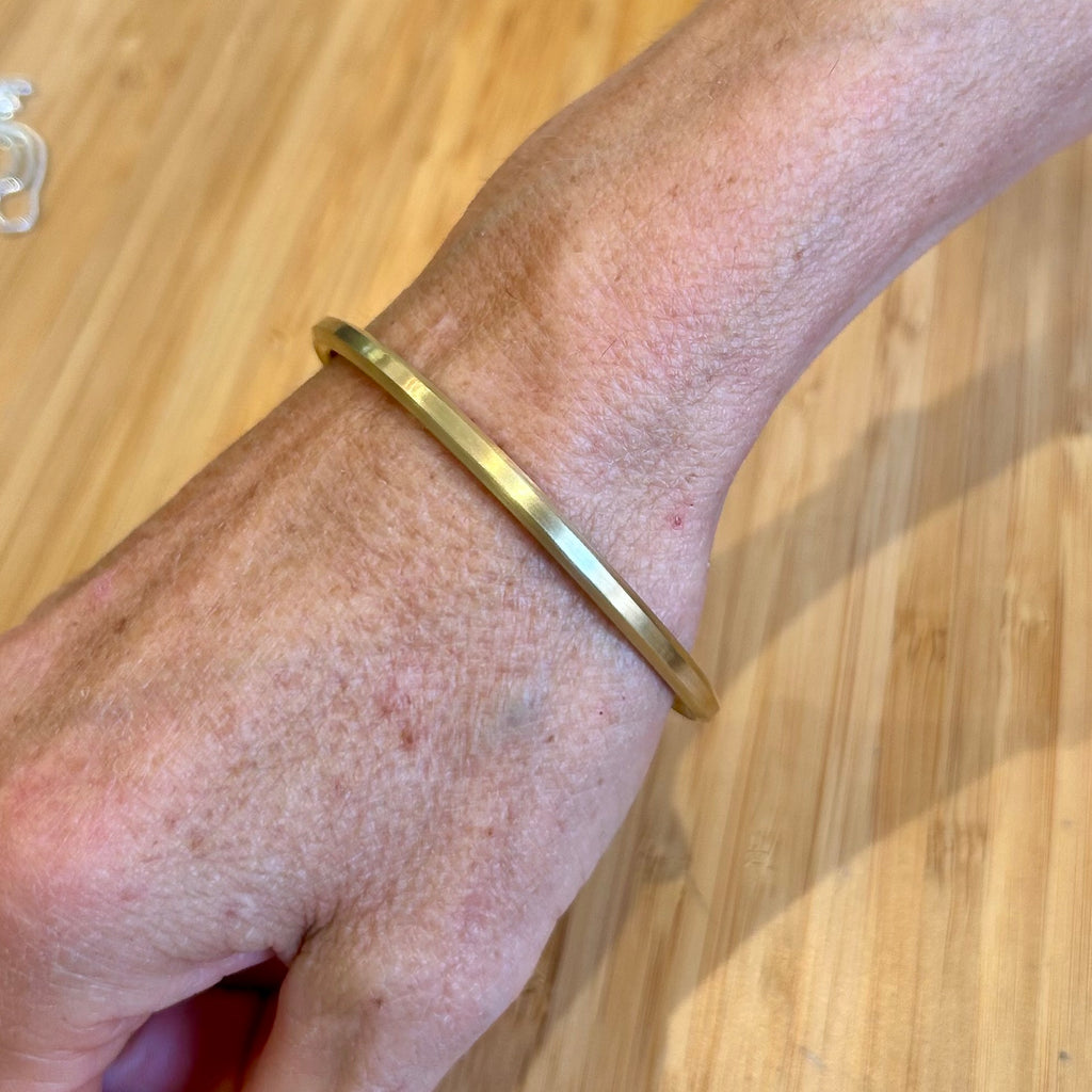 Photograph 2 of 18k Yellow Gold Hexagonal Bangle. Available on DESIGNYARD.com and in our Jewellery Shop Dublin, Ireland. Free Worldwide Shipping with DHL.