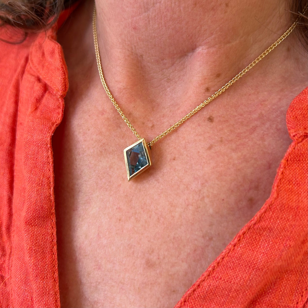 Photograph 3 of 18k Fair Trade Yellow Gold Tenues Bezəl Free Form Aquamarine Pendant. Available on DESIGNYARD.com and in our Jewellery Shop Dublin, Ireland. #1 for Contemporary Jewellery.