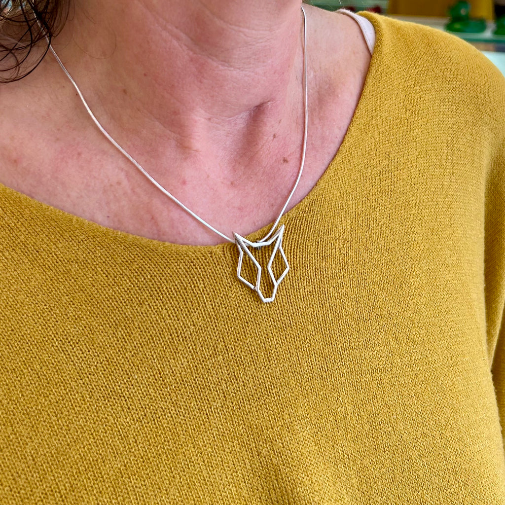 Photograph 2 of Vanessa Ree's Sterling Silver Fox Pendant. Available on DESIGNYARD.com and in our Jewellery Shop Dublin, Ireland. Free Worldwide Shipping with DHL.