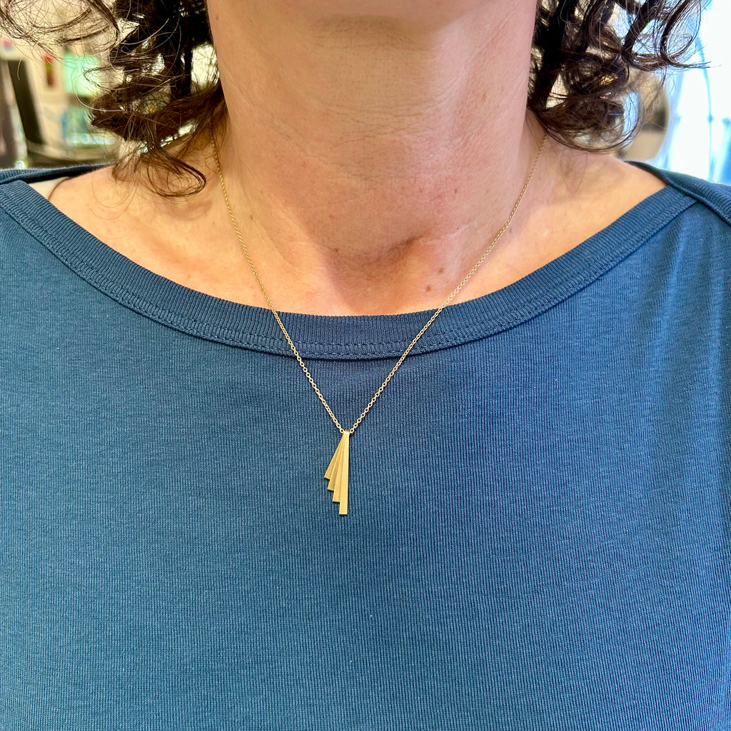 Photograph 3 of Bola Lyon's Contemporary 18k Yellow Gold Fixed Fan Pendant. Available on DESIGNYARD.com and in our Jewellery Shop Dublin, Ireland. Free Worldwide Shipping with DHL.