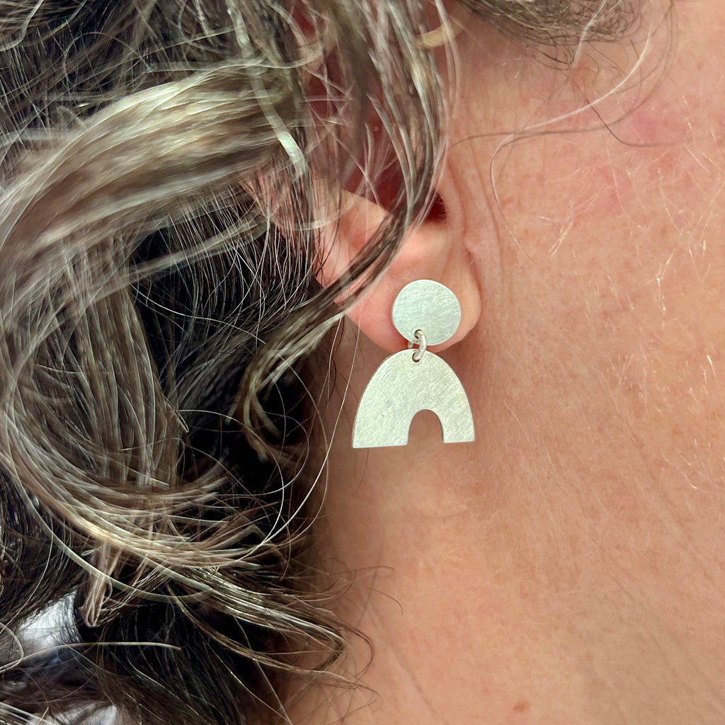 Photograph 4 of Louise O'Neill's Contemporary Sterling Silver Calder Earrings. Available on DESIGNYARD.com and in our Jewellery Shop Dublin, Ireland. Free Worldwide Shipping with DHL.
