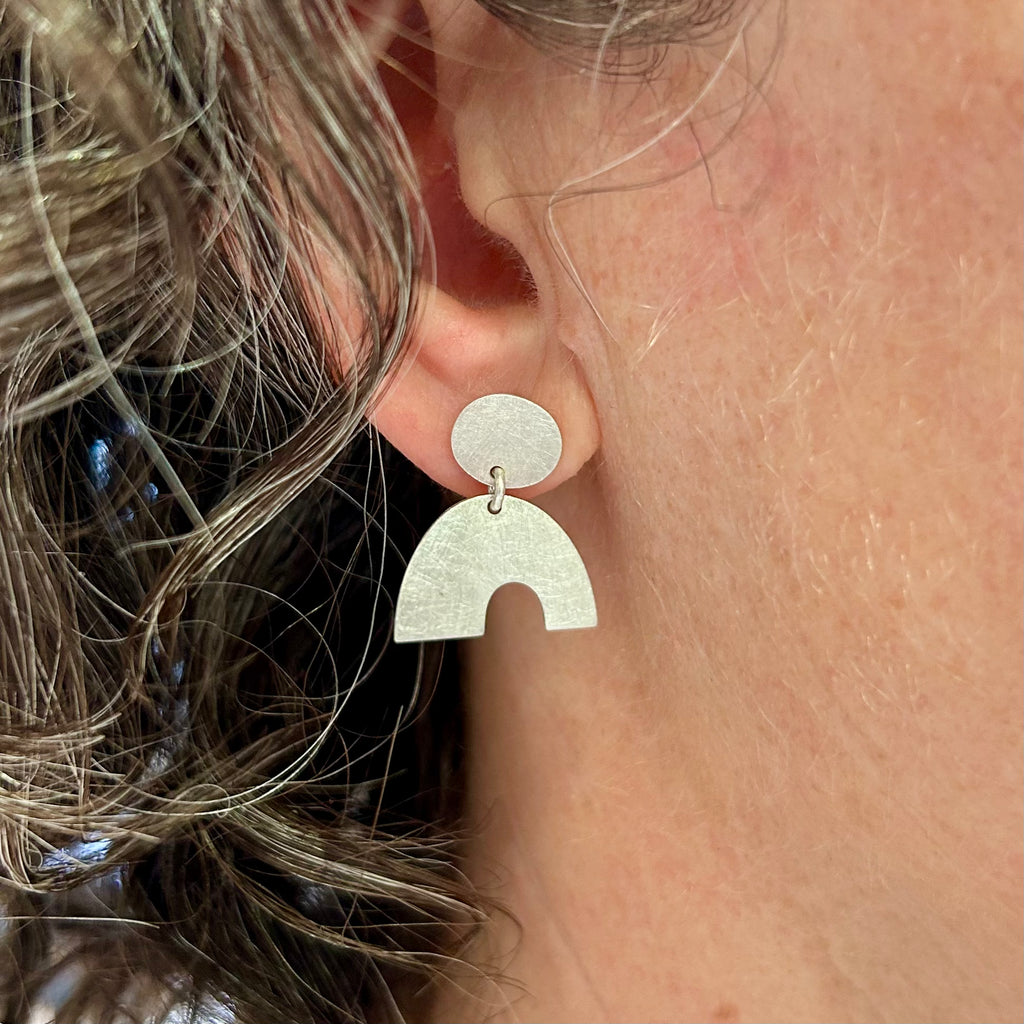 Photograph 2 of Louise O'Neill's Contemporary Sterling Silver Calder Earrings. Available on DESIGNYARD.com and in our Jewellery Shop Dublin, Ireland. Free Worldwide Shipping with DHL.