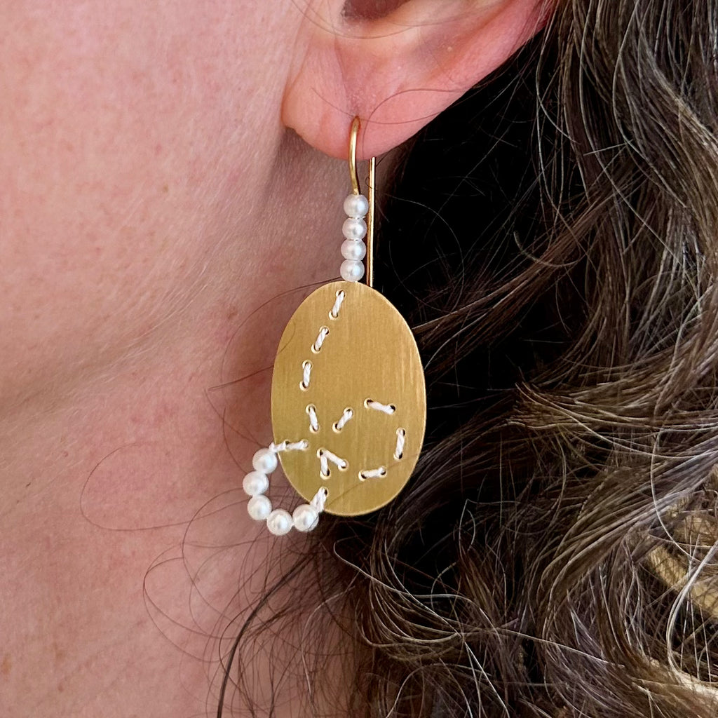 Photograph 4 of Brigitte Adolph's Contemporary Sterling Silver Gold Plate Loop Pearl Red Dot Award Winning Handmade Statement Earrings. Available on DESIGNYARD.com #1 for Contemporary Jewellery Dublin, Ireland. Free Worldwide Shipping with DHL.