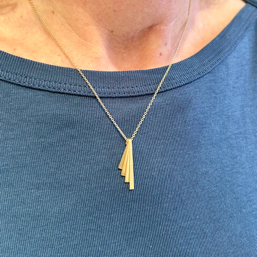 Photograph 2 of Bola Lyon's Contemporary 18k Yellow Gold Fixed Fan Pendant. Available on DESIGNYARD.com and in our Jewellery Shop Dublin, Ireland. Free Worldwide Shipping with DHL.