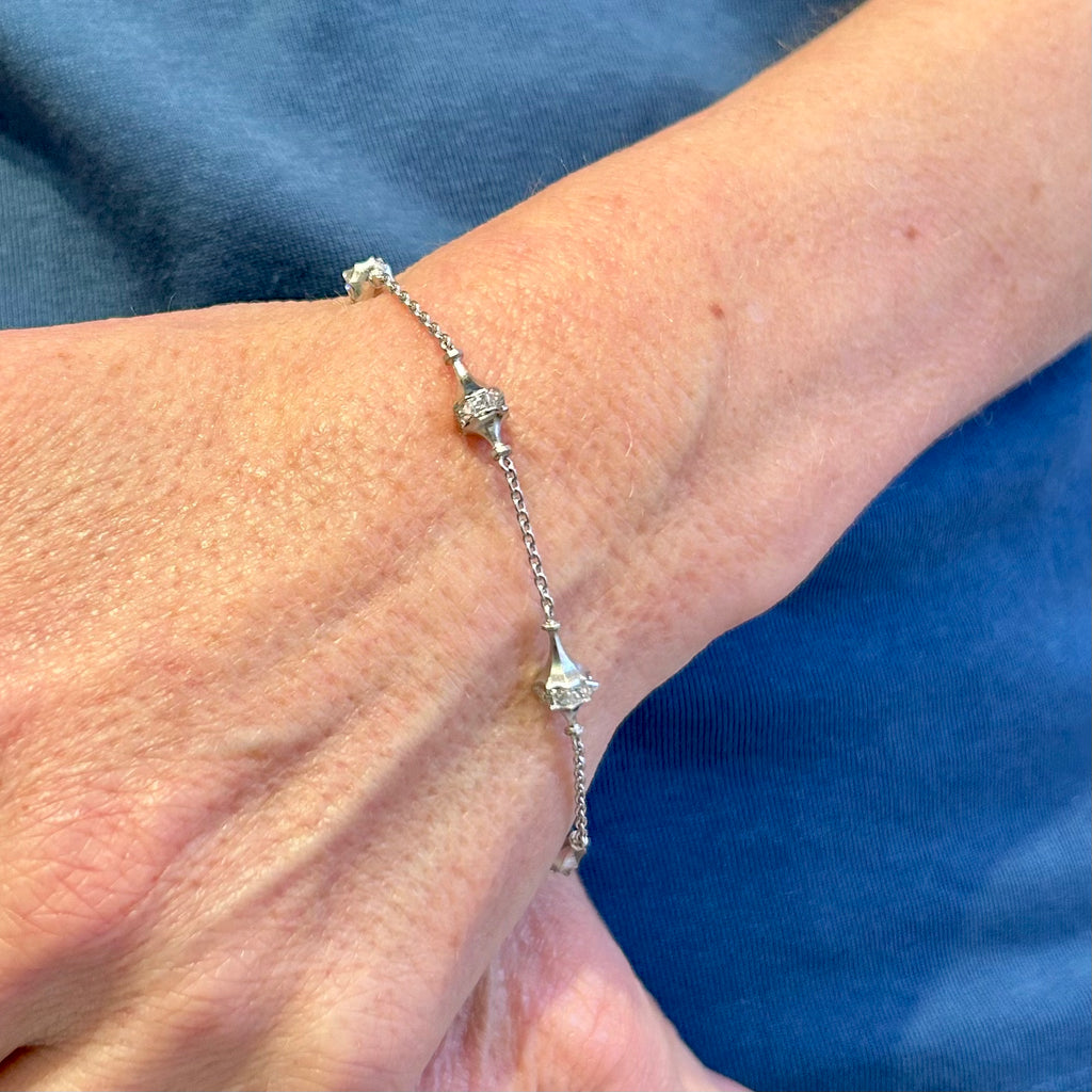 Photograph 1 of Sam Lafford's Handmade Platinum Five Lamps Diamond Bracelet. Available on DESIGNYARD.com and in our Jewellery Shop Dublin, Ireland. Worldwide Shipping with DHL.