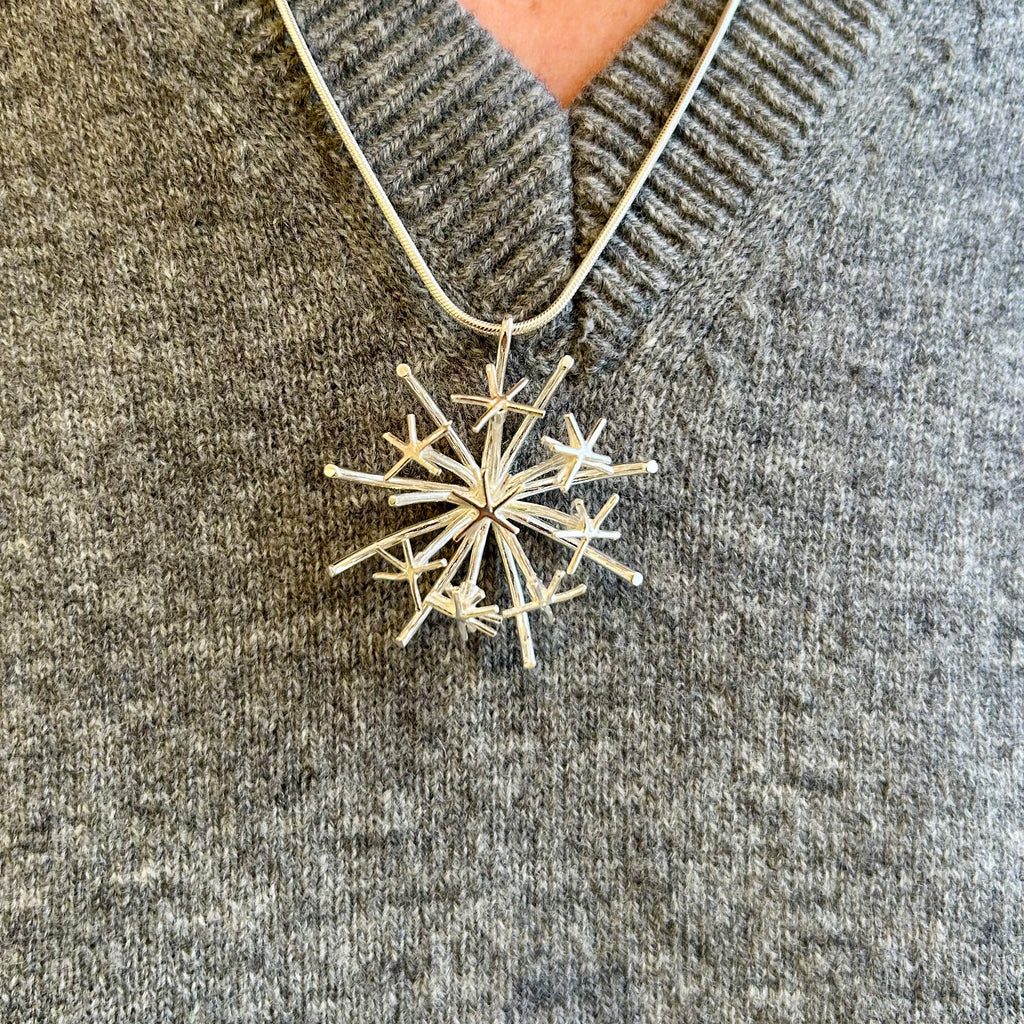 Photograph 3 of Martina Hamilton's Sterling Silver Chamaeleon Medium Pendant. Available on DESIGNYARD.com and in our Jewelry Store Dublin, Ireland.