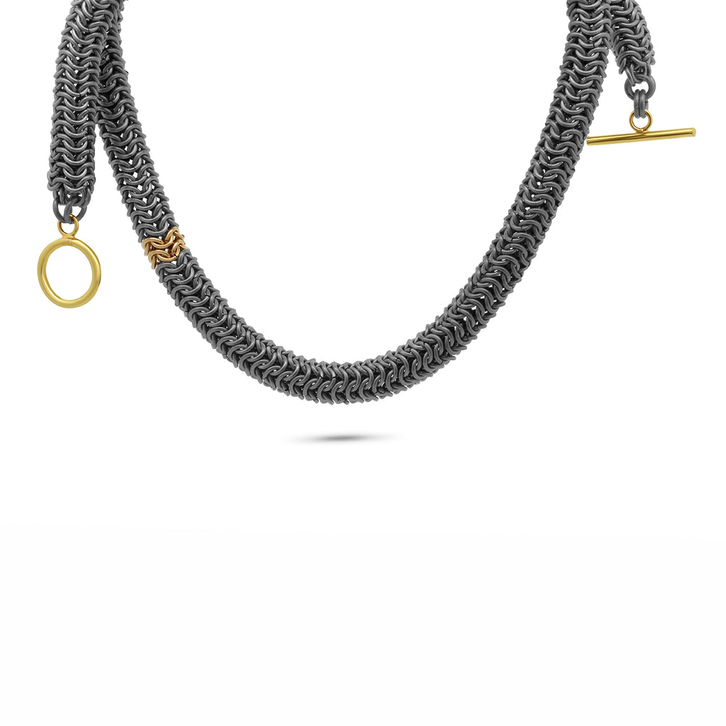 Photograph 1 of Alison Evans's Contemporary Titanium 18k Yellow Gold Tube Statement Necklace. Available on DESIGNYARD.com and in our Jewellery Shop Dublin, Ireland. Free Worldwide Shipping with DHL.