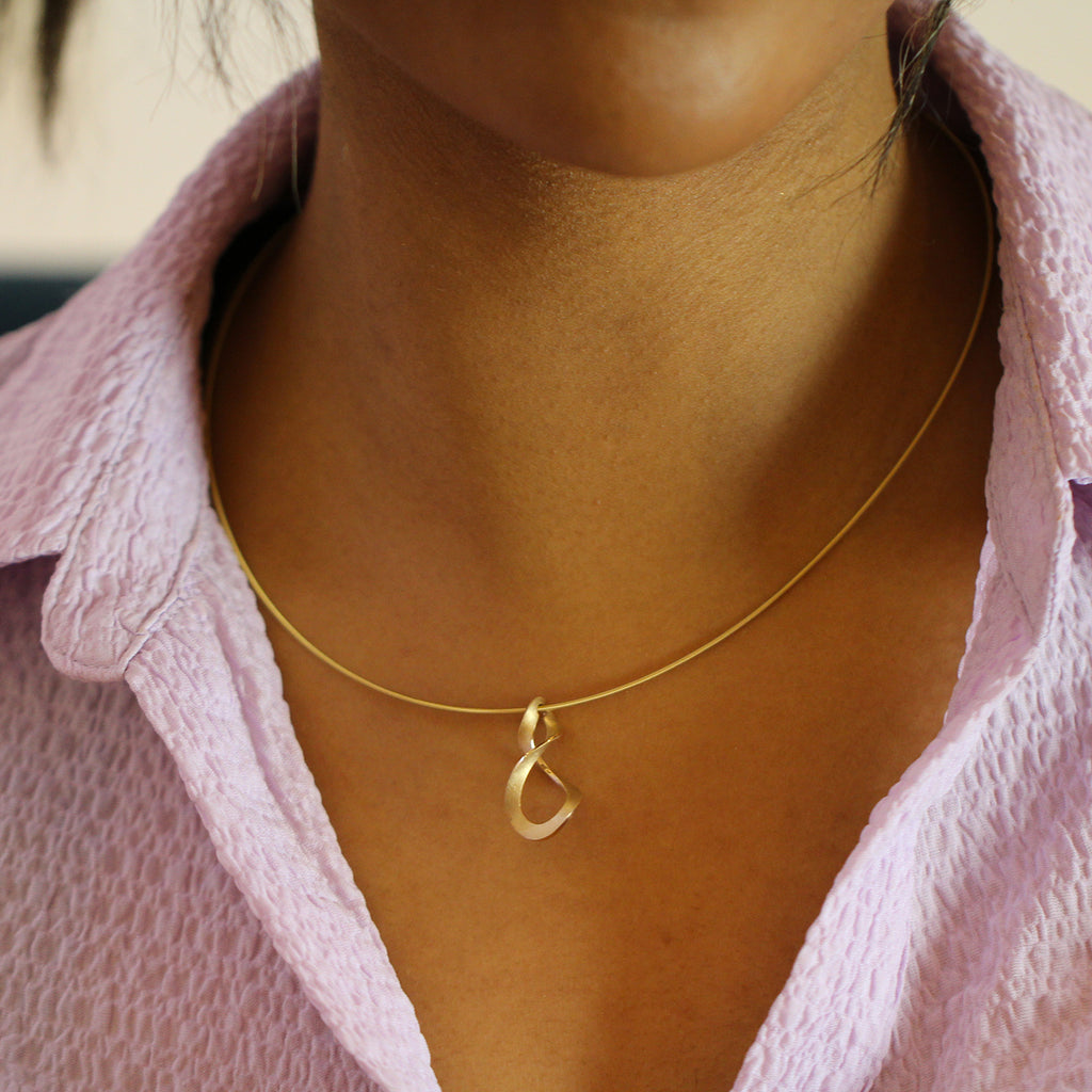 Photograph 3 of Cardillac's Contemporary 14k Yellow Gold Curl Statement Necklace. Available on DESIGNYARD.com and in our Jewellery Shop Dublin, Ireland. Free Worldwide Shipping with DHL.