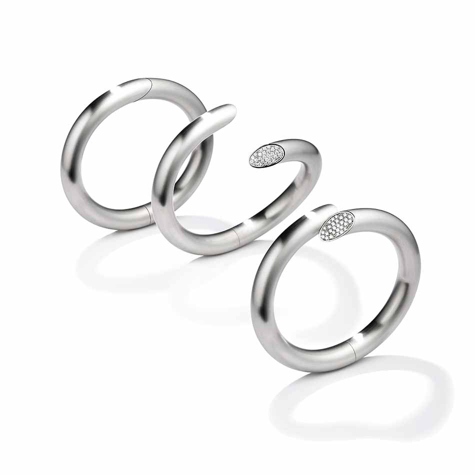 Photograph 7 of Henrich & Denzel's Janus Platinum Diamond Bangle. Available on DESIGNYARD.com and in our Contemporary Jewellery Shop Dublin, Ireland. Shipping Worldwide.