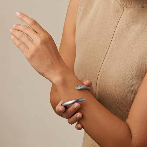 Photograph 6 of Henrich & Denzel's Janus Platinum Diamond Bangle. Available on DESIGNYARD.com and in our Contemporary Jewellery Shop Dublin, Ireland. Shipping Worldwide.