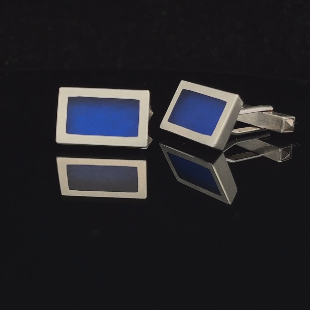Video of Monika Jakubec's Contemporary Silver Blue Resin Cufflinks. Available on DESIGNYARD.com and in our Jewellery Shop Dublin, Ireland. Free Worldwide Shipping with DHL.