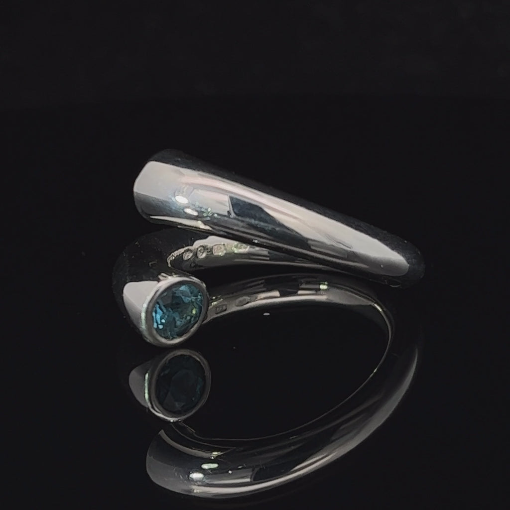 Video of Paul Finch's Contemporary Silver & Blue Topaz Statement Ring. Available on DESIGNYARD.com and in our Jewellery Shop Dublin, Ireland. Free Worldwide Shipping with DHL.
