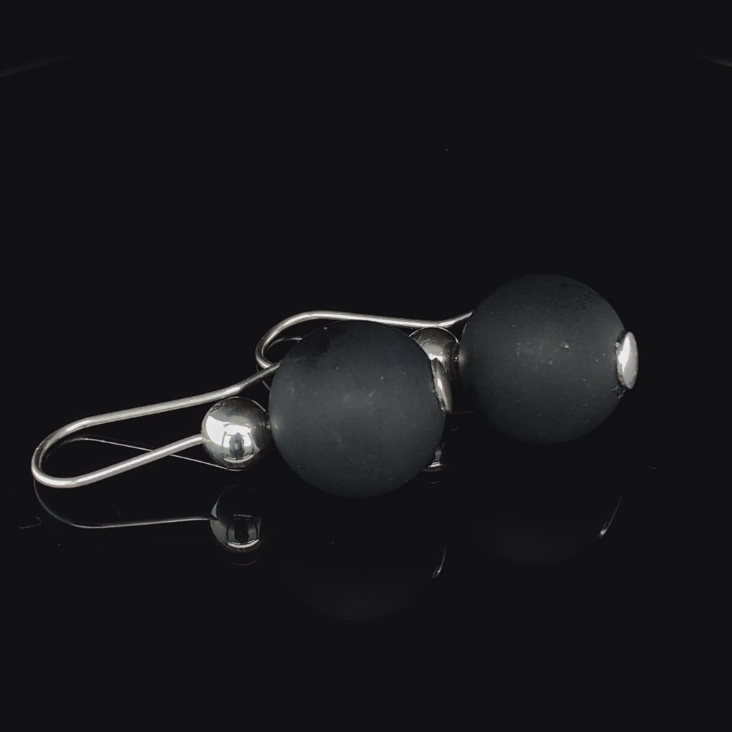 Video of Inga Reed's Sterling Silver Onyx Drop Earrings. Available on DESIGNYARD.com and in our Jewellery Shop Dublin, Ireland.