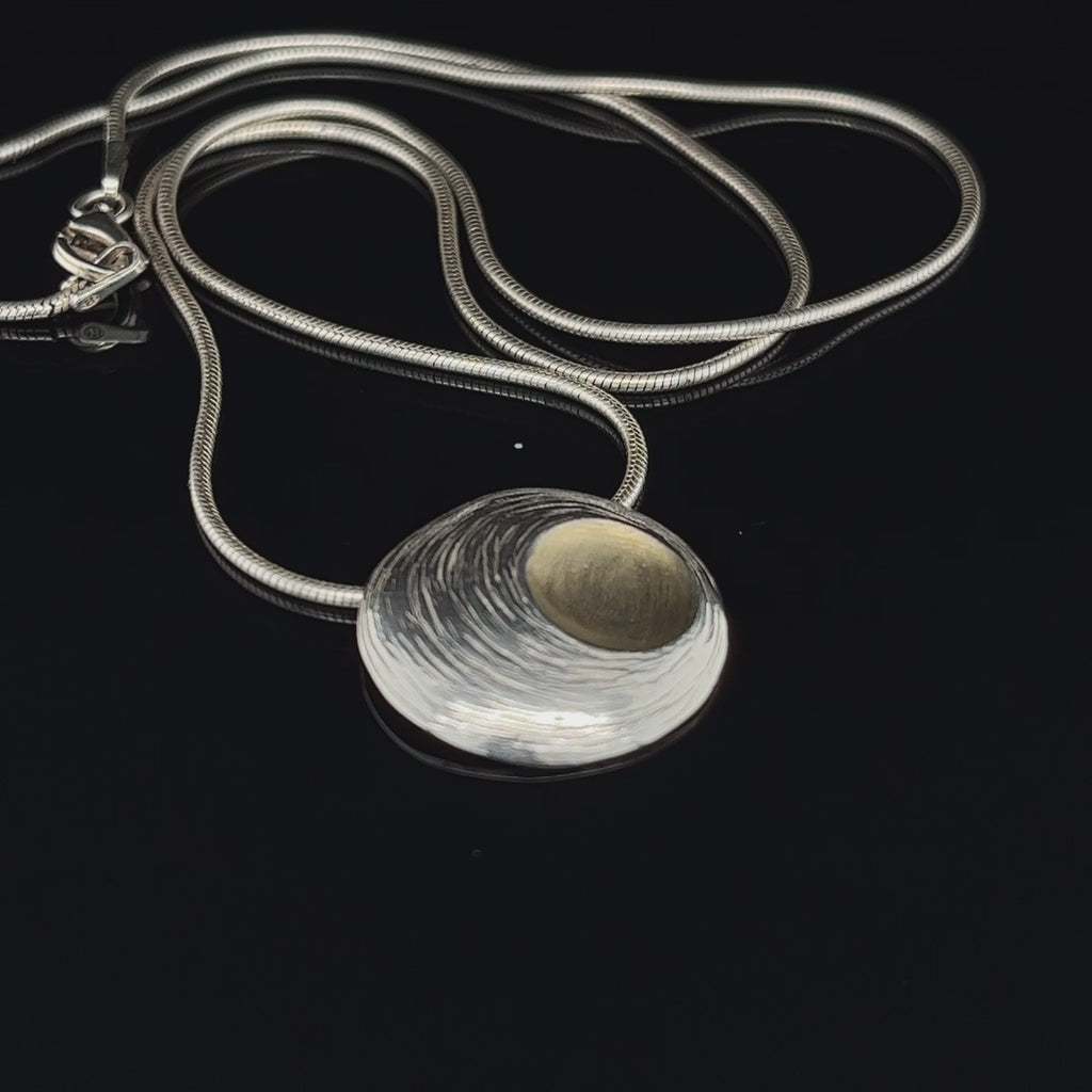 Video of Martina Hamilton's Contemporary Sterling Silver Moon Shell Pendant. Available on DESIGNYARD.com and in our Jewellery Shop Dublin, Ireland.