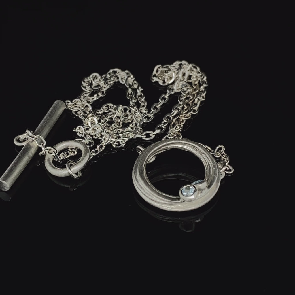 Video of Kate Smith's Contemporary Sterling Silver Aquamarine Swirl Necklace. Available on DESIGNYARD.com and in our Jewellery Shop Dublin, Ireland. Free Worldwide Shipping with DHL.