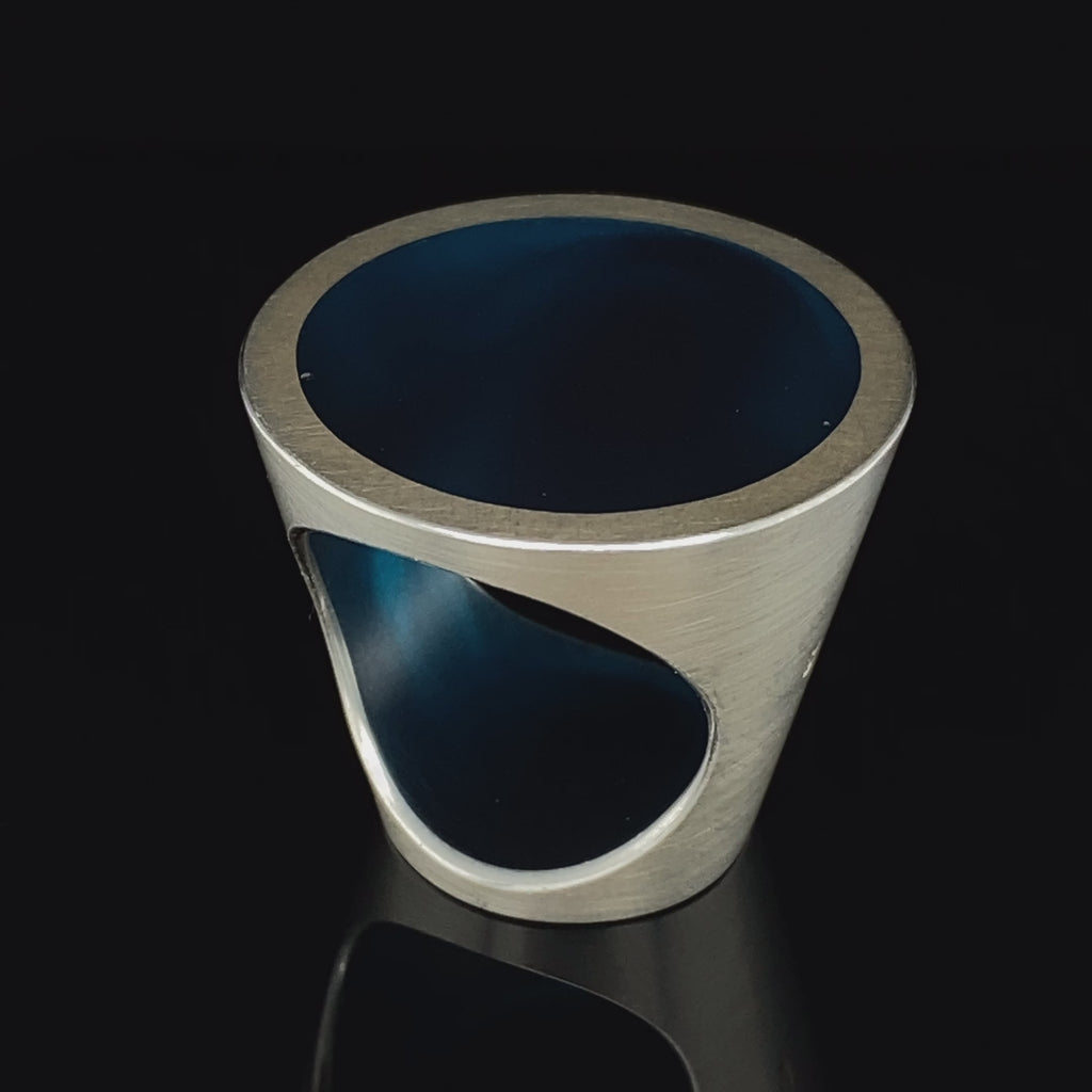 Video of Monika Jakubec's Contemporary Sterling Silver Petrol Blue Resin Cone Statement Ring. Available on DESIGNYARD.com and in our Jewellery Shop Dublin, Ireland. Free Worldwide Shipping with DHL.