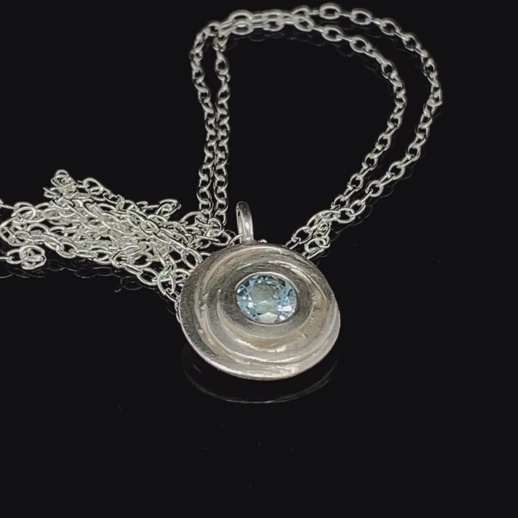 Video of Kate Smith's Contemporary Sterling Silver Aquamarine Swirl Pendant. Available on DESIGNYARD.com and in our Jewellery Shop Dublin, Ireland. Free Worldwide Shipping with DHL.