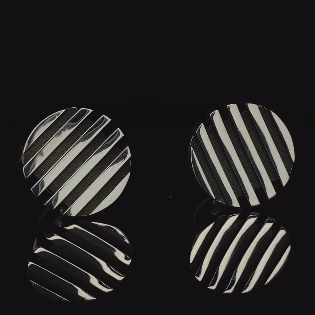Video of Sarah Herriot's Contemporary Silver Oxidised Escalator Stud Statement Earrings. Available on DESIGNYARD.com and in our Jewellery Shop Dublin, Ireland. Free Worldwide Shipping with DHL.