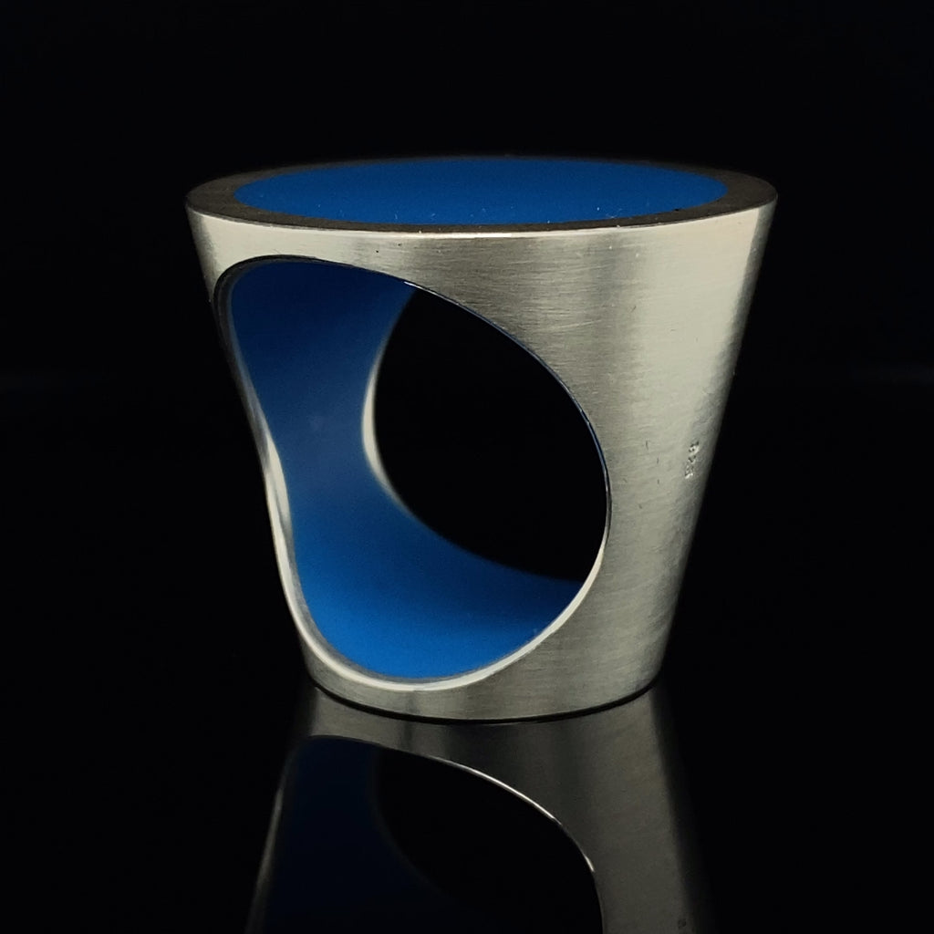 Video of Monika Jakubec's Contemporary Silver Sky Blue Resin Cone Statement Ring. Available on  DESIGNYARD.com and in our Jewellery Shop Dublin, Ireland. Free Worldwide Shipping with DHL.