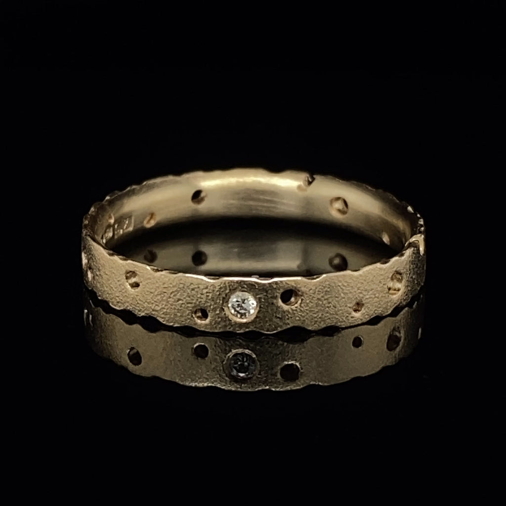 Video of Kate Smith's Contemporary 9k Yellow Gold Nibbled Diamond Wedding Ring. Available on  DESIGNYARD.com and in our Jewellery Shop Dublin, Ireland. Free Worldwide Shipping with DHL.