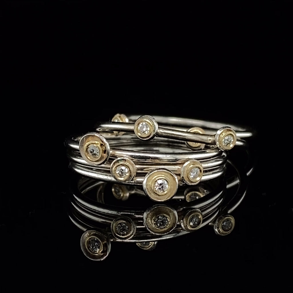 Video of Shimara Carlow's Organic Sterling Silver & 18k Yellow Gold Diamond Acorn Cup Stacking Rings. Available on DESIGNYARD.com and in our Jewellery Shop Dublin, Ireland. Free Worldwide Shipping with DHL.