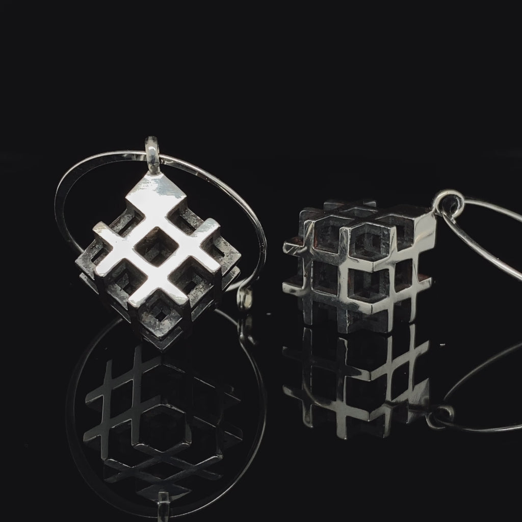 Video of Vanessa Ree's Contemporary Sterling Silver Oxi 3D# Positive Hoop Earrings. Available on  DESIGNYARD.com Number 1 for Contemporary Jewellery In Europe. Visit our Jewellery Store Dublin, Ireland.