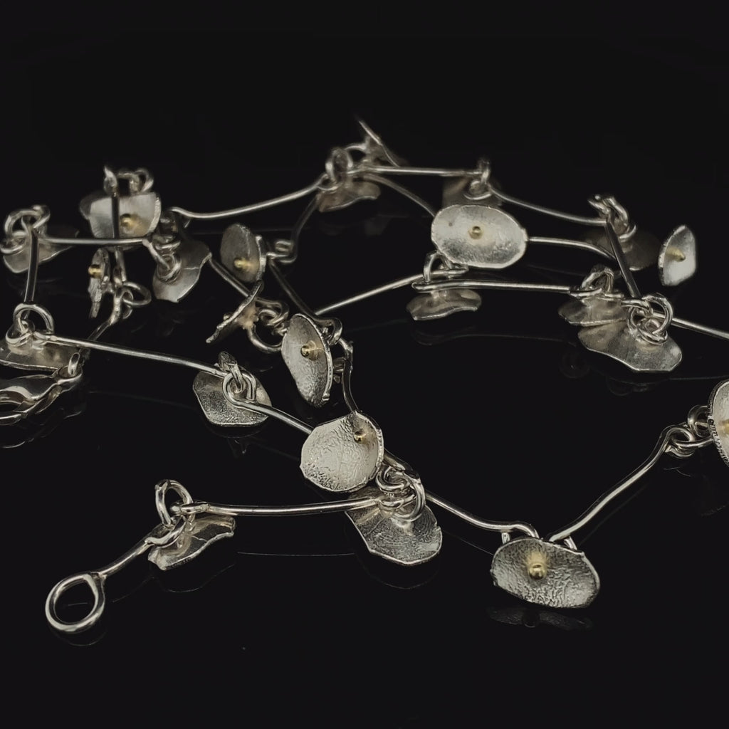 Video of Shimara Carlow's Contemporary Silver & 18k Yellow Gold Honesty Necklace. Available on
 DESIGNYARD.com and in our Jewellery Shop Dublin, Ireland. Free Worldwide Shipping with DHL.