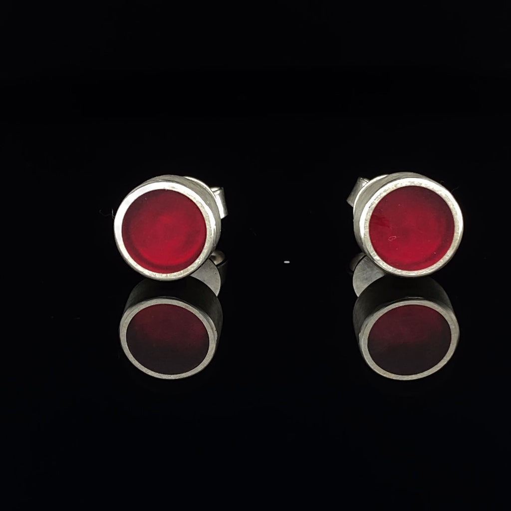 Video of Monika Jakubec's Contemporary Silver Red Resin Round Micro Stud Earrings. Available on DESIGNYARD.com and in our Jewellery Shop Dublin, Ireland. Free Worldwide Shipping with DHL.