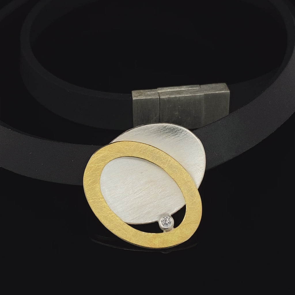 Video of Manu's Contemporary Sterling Silver 22k Yellow Gold Bi-metal Intertwined Diamond Necklace. Available on DESIGNYARD.com and in our Jewellery Shop Dublin, Ireland. Free Worldwide Shipping with DHL.