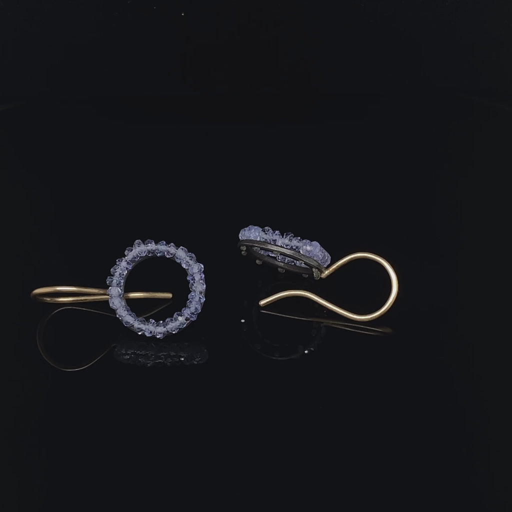Video of Sophia Epp's Contemporary Oxidized Silver 18k Yellow Gold Tanzanite Mini Circle Statement Earrings. Available on DESIGNYARD.com and in our Jewelery Shop Dublin, Ireland.