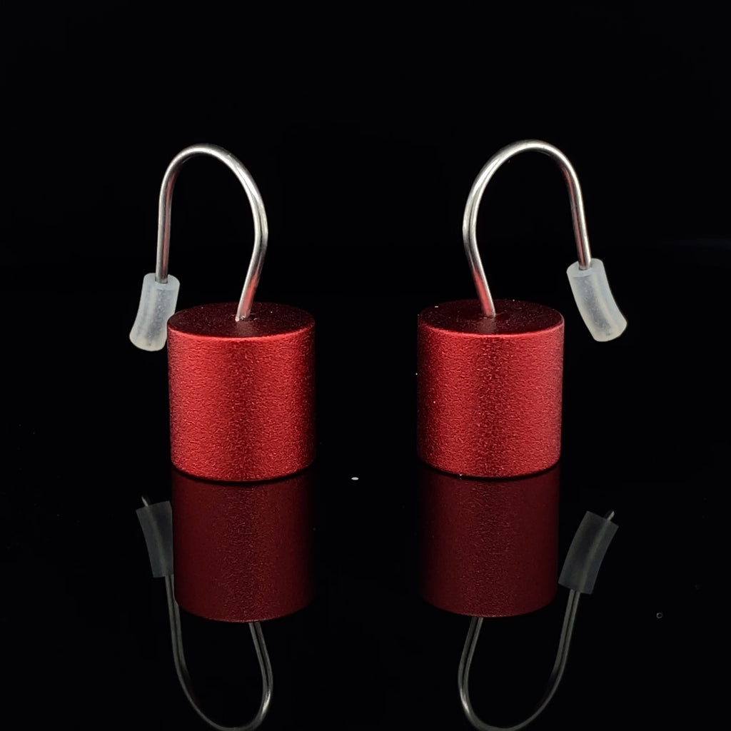 Video of Ursula Muller's Contemporary Red Aluminium Roller Earrings. Available on DESIGNYARD.com and in our Jewellery Shop Dublin, Ireland. Worldwide Shipping with DHL.