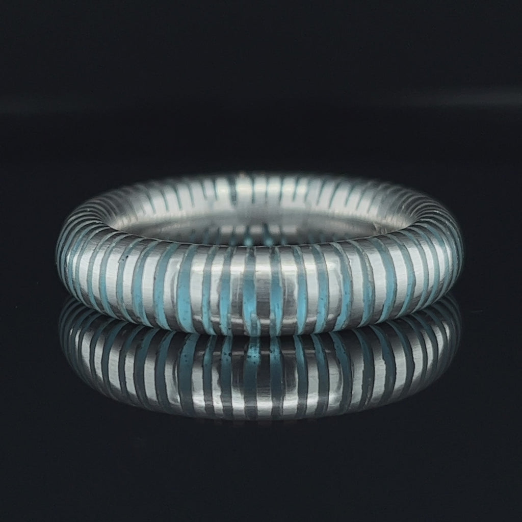 Video of Monika Jakubec's Contemporary Silver Aqua Resin Cebra Statement Ring. Available on DESIGNYARD.com and in our Jewellery Shop Dublin, Ireland. Free Worldwide Shipping with DHL.