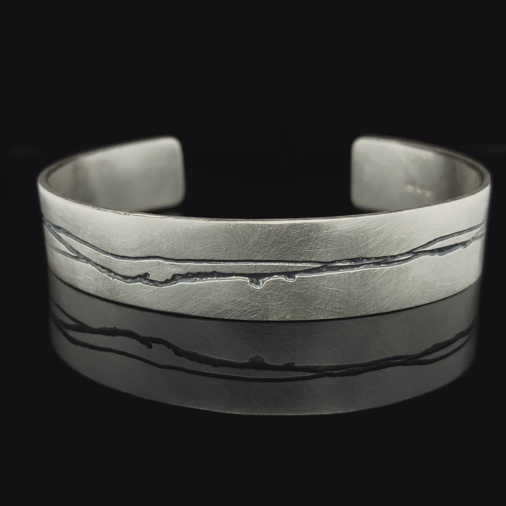 Video of Kate Smith's Contemporary Sterling Silver Oxidised Etched Cuff. Available on DESIGNYARD.com and in our Jewellery Shop Dublin, Ireland. Free Worldwide Shipping with DHL.