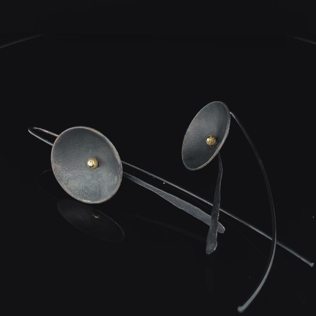 Video of Shimara Carlow's Contemporary Oxidised Silver 18k Yellow Gold Daisy Hook Earrings. Available on DESIGNYARD.com and in our Jewellery Shop Dublin, Ireland. Free Worldwide Shipping with DHL.