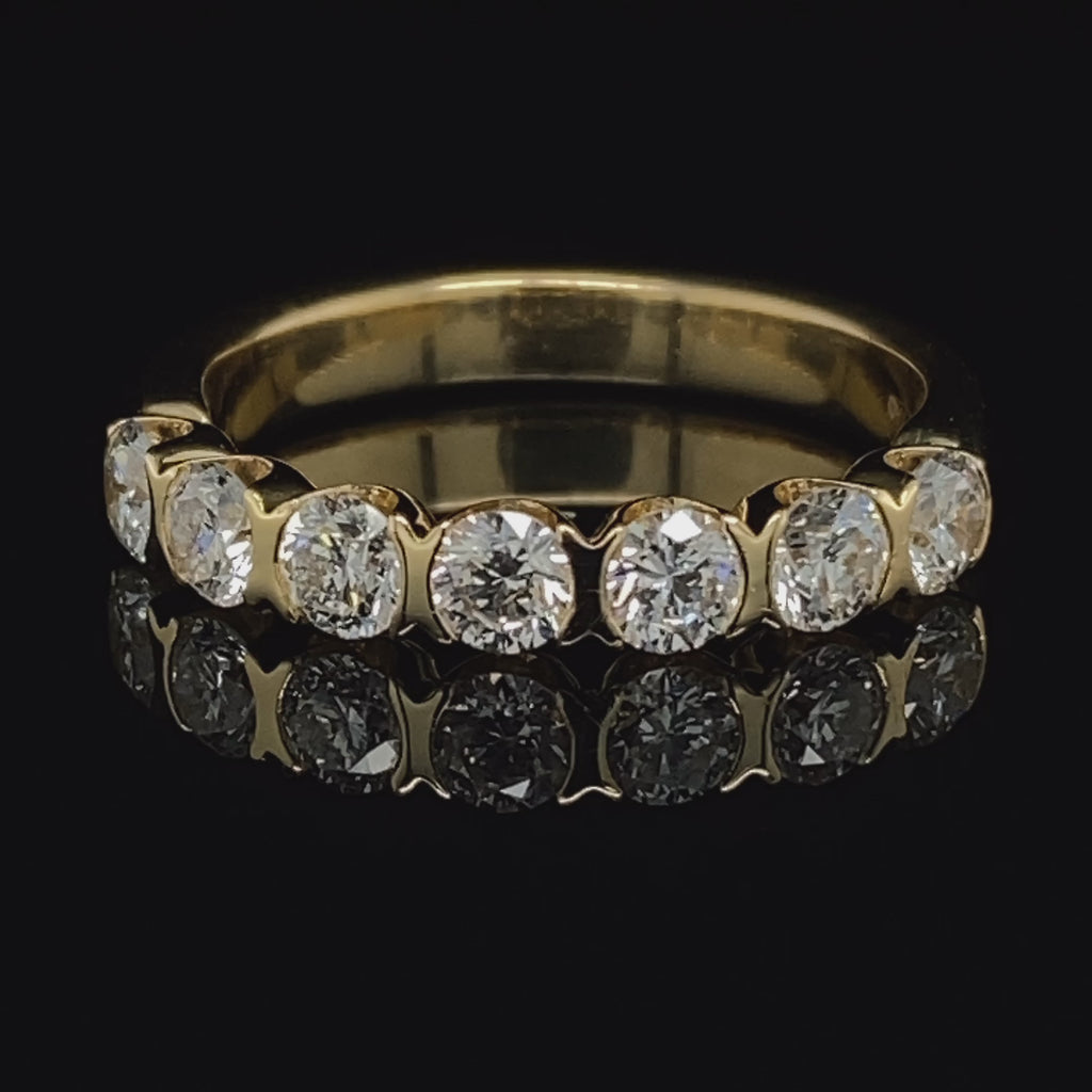 Video of 18k Yellow Gold Seven Diamond Wedding Ring. Available on DESIGNYARD.com and in our Jewellery Shop Dublin, Ireland. Free Worldwide Shipping with DHL.
