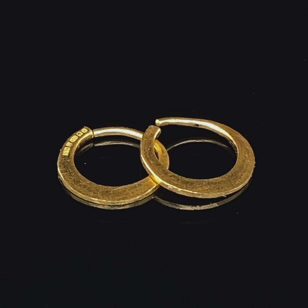 Video of Sarah Herriot's Contemporary 24k Yellow Gold Hoops 12mm. Available on DESIGNYARD.com and in our Jewellery Shop Dublin, Ireland. Free Worldwide Shipping with DHL.