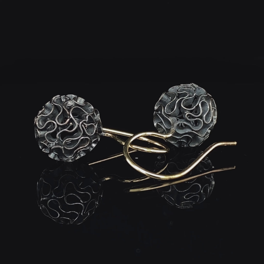 Video of Myriam Oude Vrielink's Oxidised Sterling Silver Coral Earrings. Available on DESIGNYARD.com and in our Contemporary Jewellery Shop Dublin, Ireland. Free Worldwide Shipping with DHL.