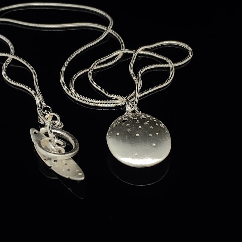 Video of Kate Smith's Contemporary Sterling Silver Pod Pendant. Available on DESIGNYARD.com and in our Jewellery Shop Dublin, Ireland. Free worldwide Shipping with DHL.