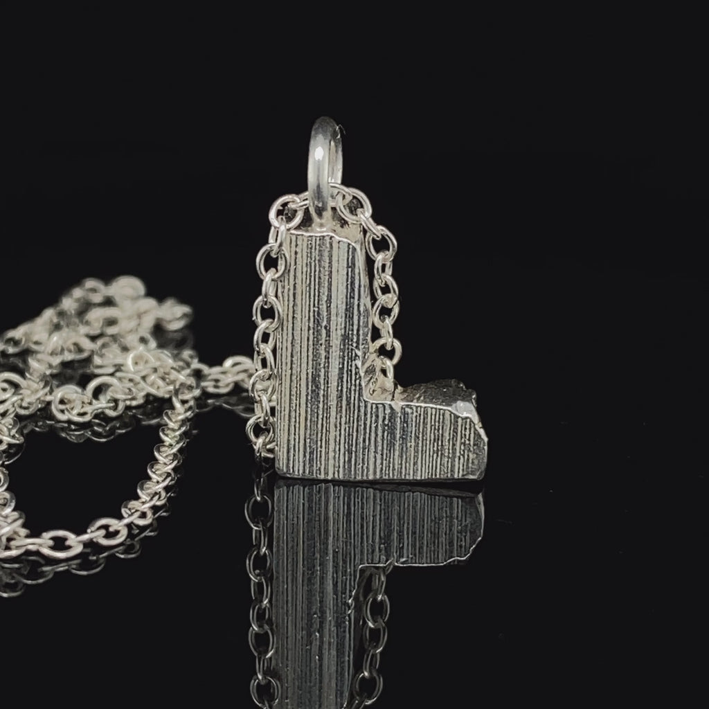 Video of Xavier Lafford's Contemporary Sterling Silver Chunky L Pendant.  Available on DESIGNYARD.com and in our Jewellery Shop Dublin, Ireland. Shipping Worldwide.