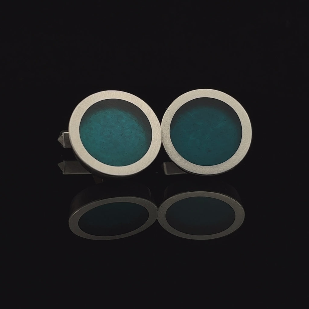 Video of Monika Jakubec's Contemporary Silver Petrol Blue Resin Cufflinks. Available on DESIGNYARD.com and in our Jewellery Shop Dublin, Ireland. Free Worldwide Shipping with DHL.