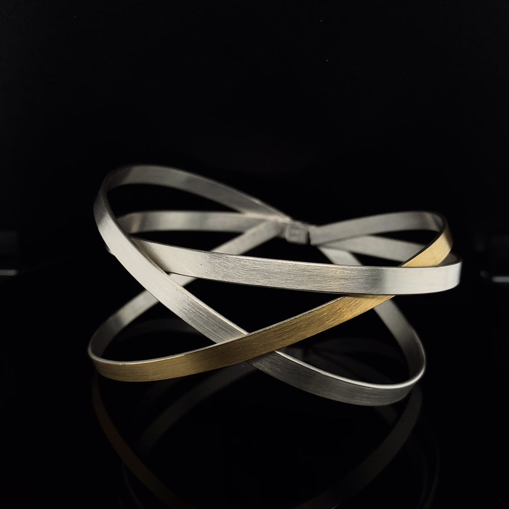 Manu - Sterling Silver 22k Yellow Gold Bi-Metal Dancing Ribbons Bracelet - DESIGNYARD, Dublin Ireland.