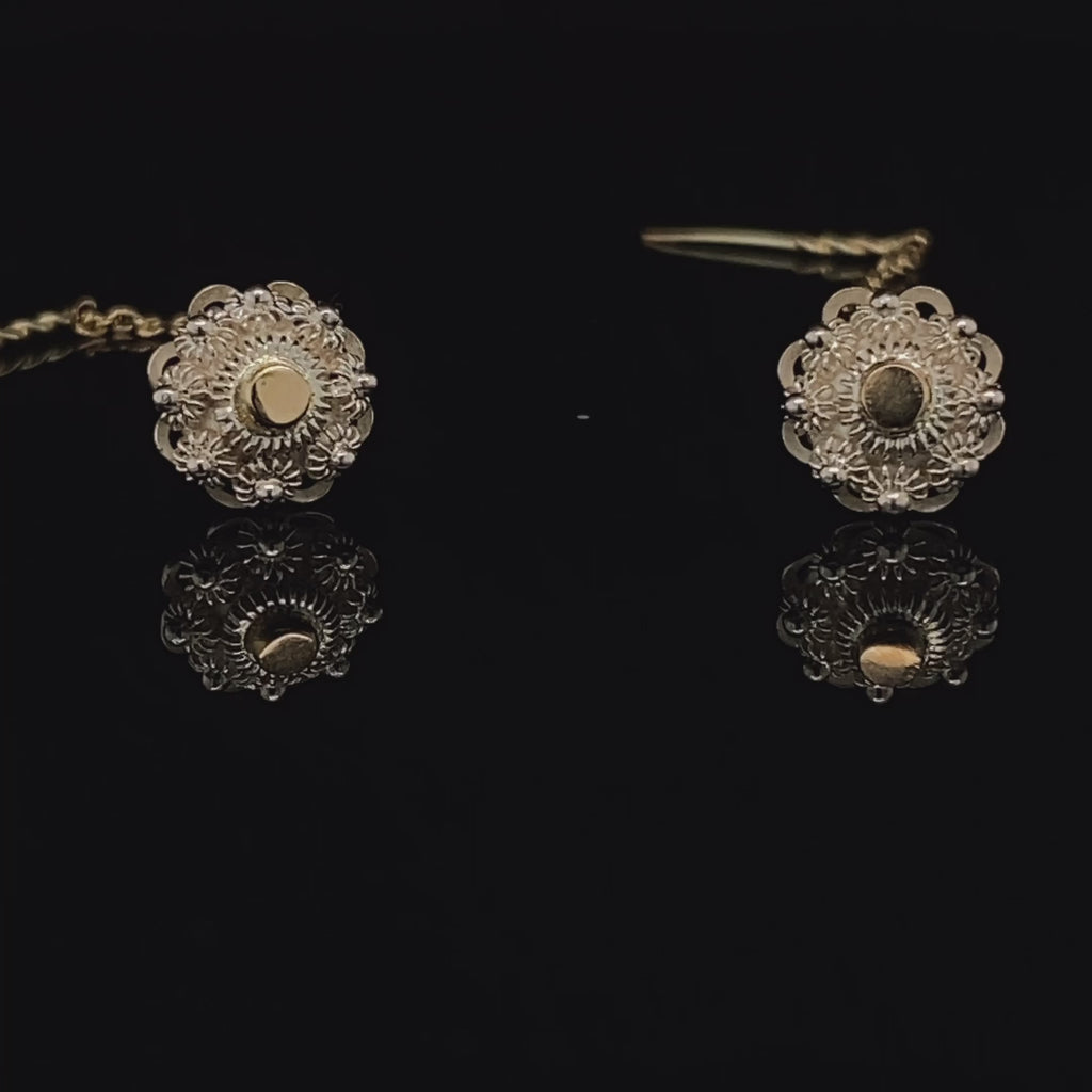 Video of Neeltje Huddleston Slater's Sterling Silver & 14k Yellow Gold Zeeland Button Earrings. Available on DESIGNYARD.com and in our Contemporary Jewellery Shop Dublin, Ireland. #1 for Contemporary Jewellery.