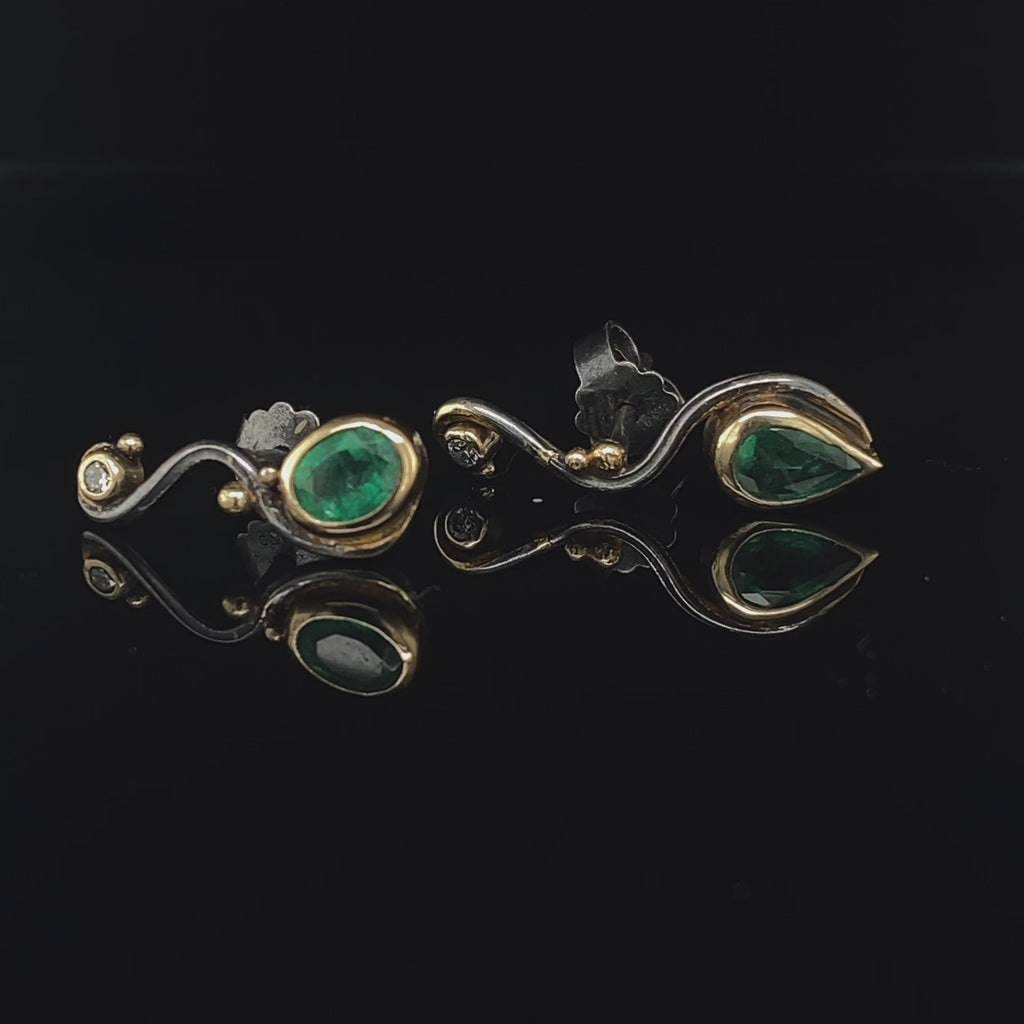 Video of Josephine Bergsøe's Organic Silver & Gold Emerald Diamond Seafire Earrings. Available on DESIGNYARD.com and in our Jewellery Shop Dublin, Ireland. Free Worldwide Shipping with DHL.