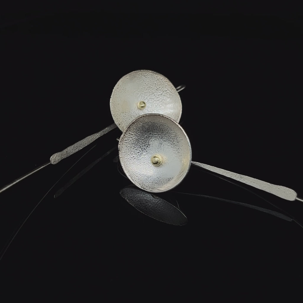 Video of Shimara Carlow's Organic Sterling Silver & 18k Yellow Gold Daisy Hook Earrings. Available on  DESIGNYARD.com and in our Jewellery Shop Dublin, Ireland. Free Worldwide Shipping with DHL.